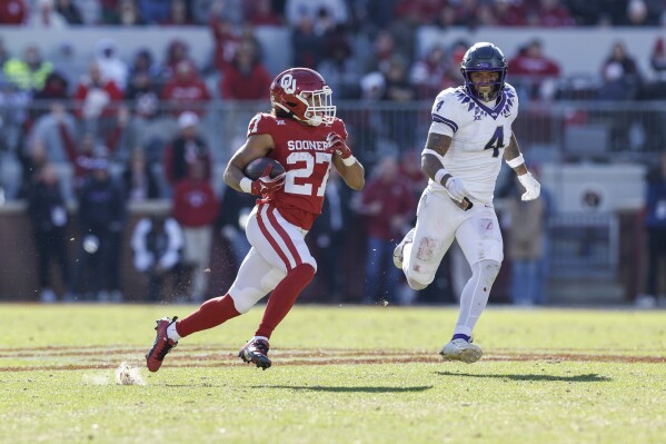 Gabriel passes for 400 yards as No. 13 Oklahoma beats TCU 69 45